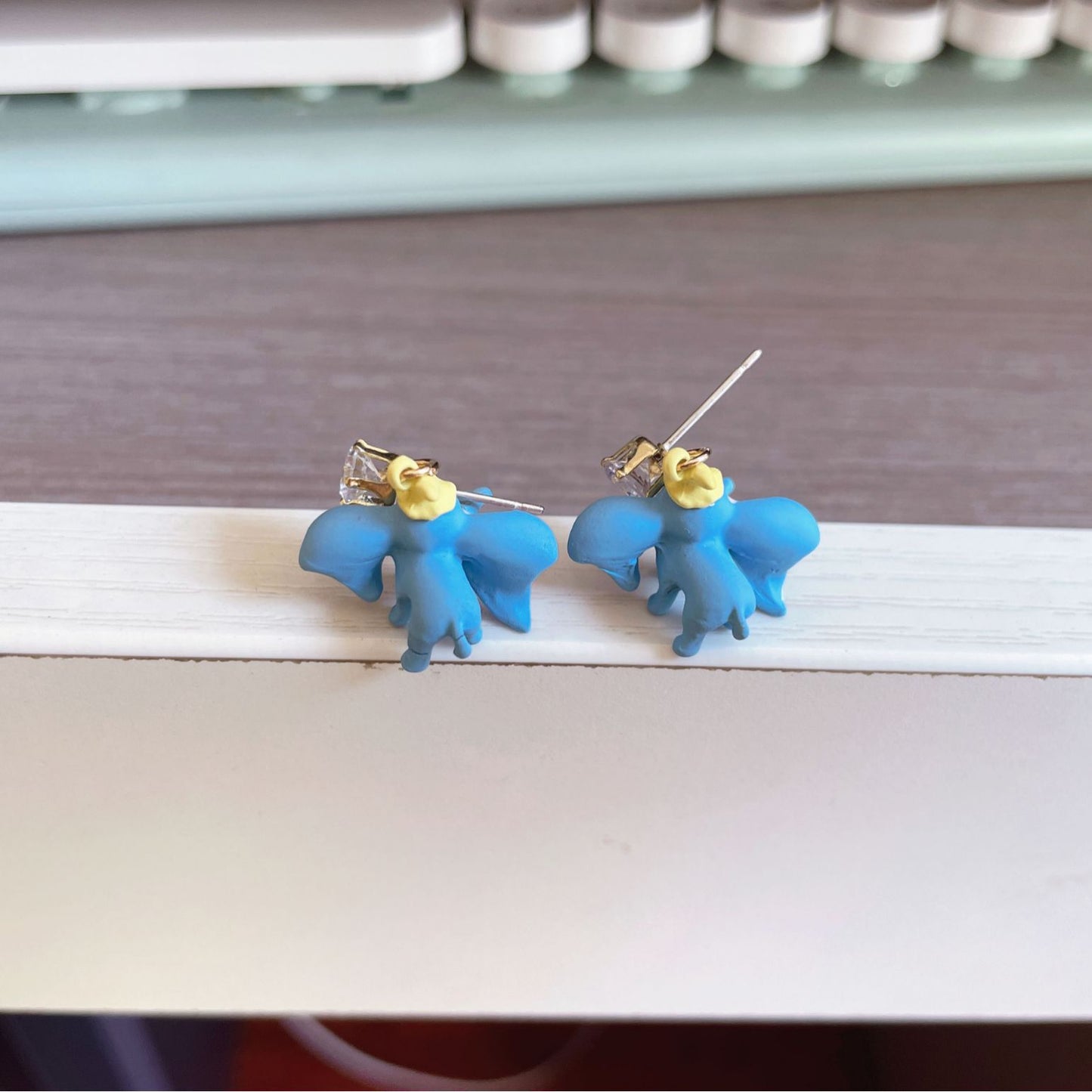 Alloy cartoon flying elephant earrings MIC-JiX035