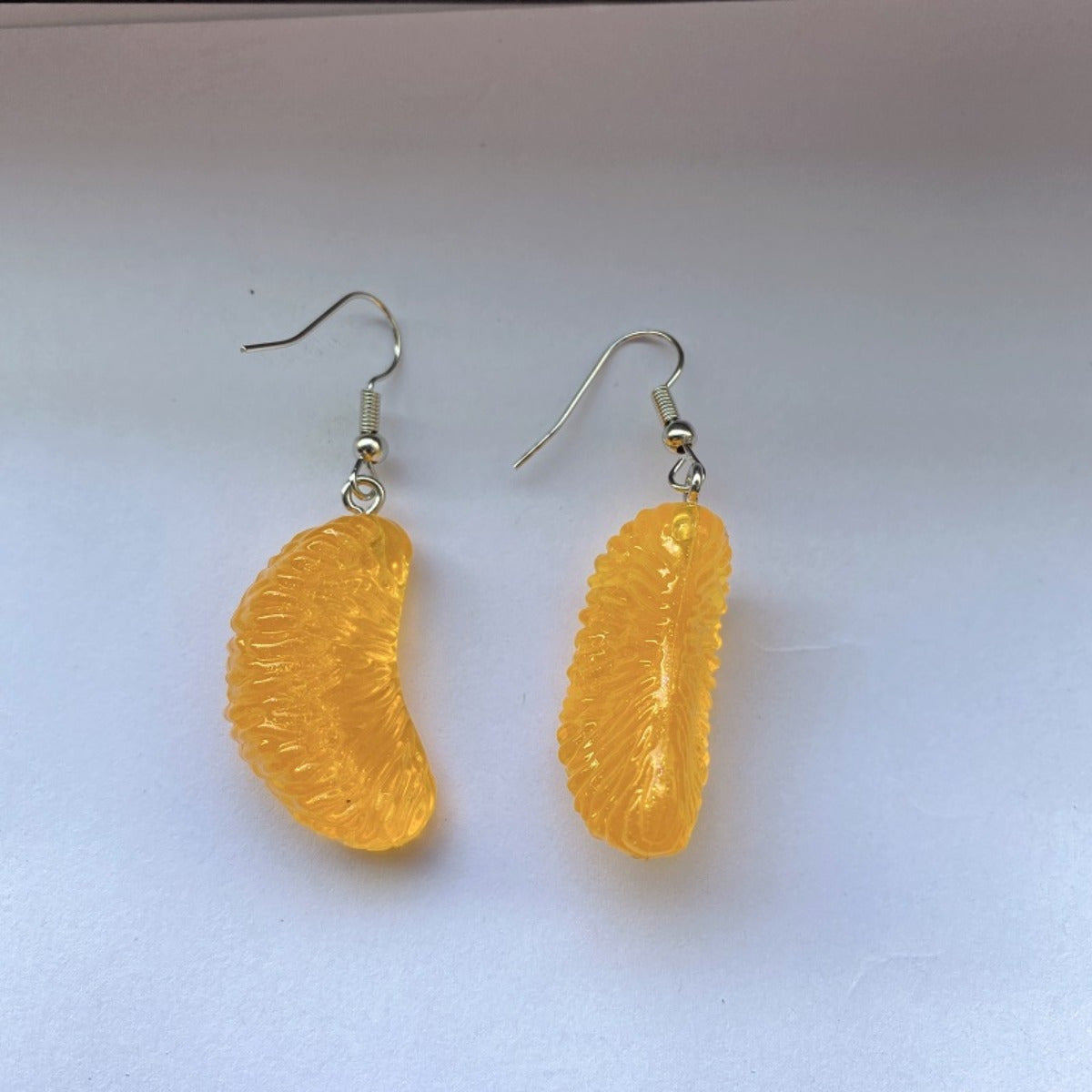 Alloy resin green leaf big yellow pomelo earrings (Minimo de compra 2） MYA-GenL003