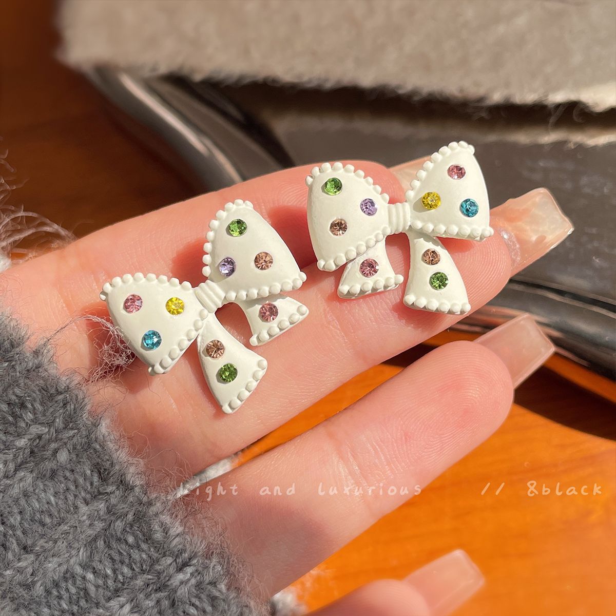 Acrylic colored diamond bow earrings (Minimo de Compra 2) MIC-ShuangX023