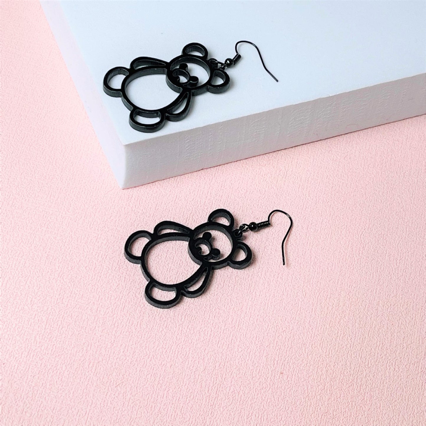 Acrylic black border hollowed out little bear earrings MYA-ChiC030