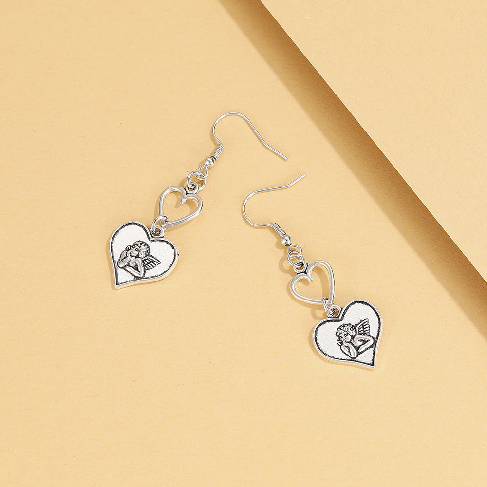 Alloy Hollow Heart Earrings (Minimo de Compra 2) MIC-YingM016