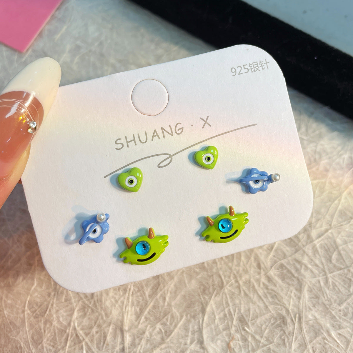 Alloy heterochromatic cute little monster earrings MYA-ShuangX050