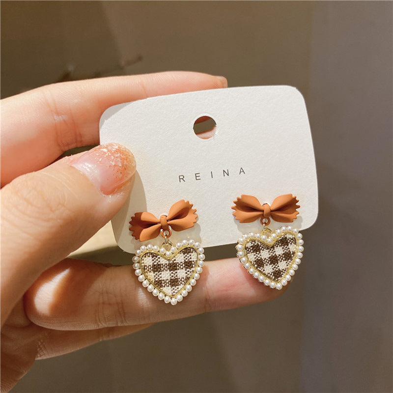 Alloy New Love Bow Earrings (Minimo de Compra 2) MIC-XingS015