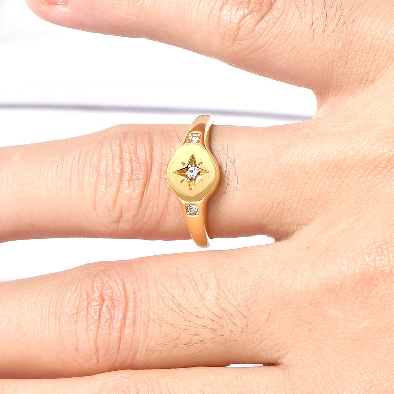 Stainless steel gold-plated ring with three diamonds MYA-YHZX021