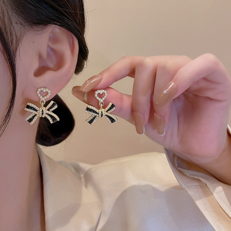 Alloy black bow earrings MYA-HanJ019