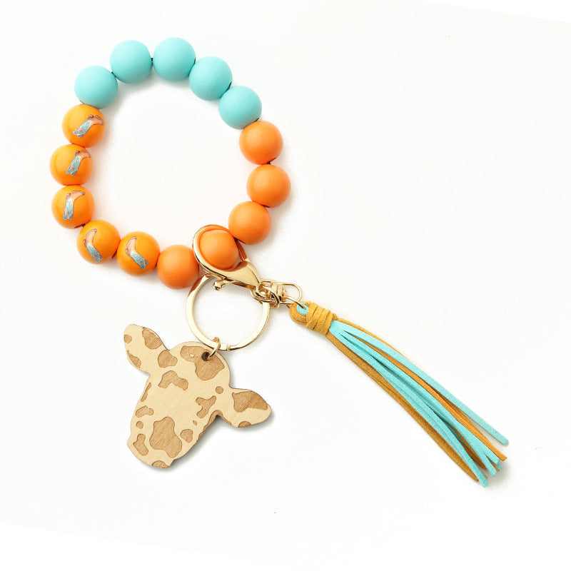 Keychains Bull Head Tassel Pendant Western Cowboy Cow Wooden Beads Bracelet MIC-NuoYi022