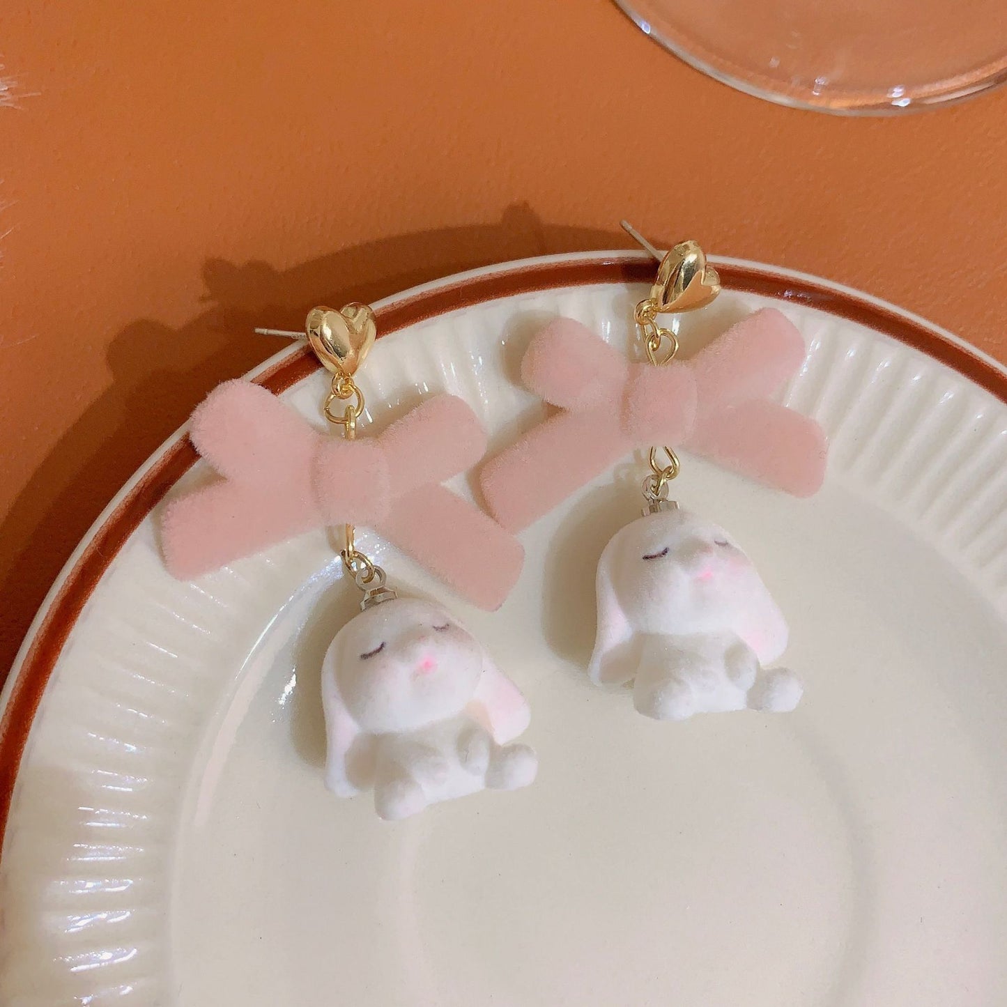 Flocking New Bow Long Rabbit Earrings (Minimo de Compra 2) MIC-YouX007