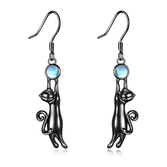 Alloy little black cat holding egg white stone earrings (Minimo de compra 10) MIC-ZhuY005