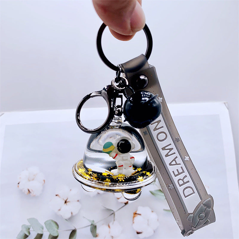 Keychains For Backpacks personality black gold dream astronaut spaceship into oil keychain MOQ≥2 DMF012