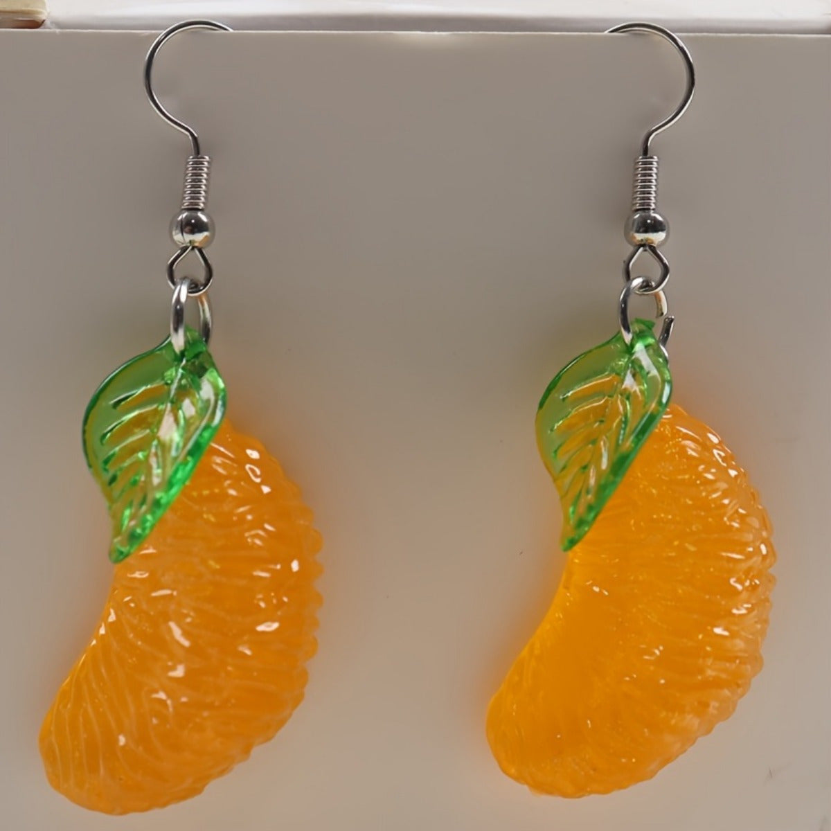 Alloy resin green leaf big yellow pomelo earrings (Minimo de compra 2） MYA-GenL003