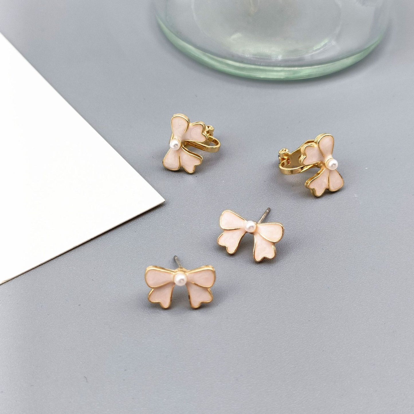 Alloy drip pearl bow ear clip (Minimo de Compra 2) MIC-KaiT014