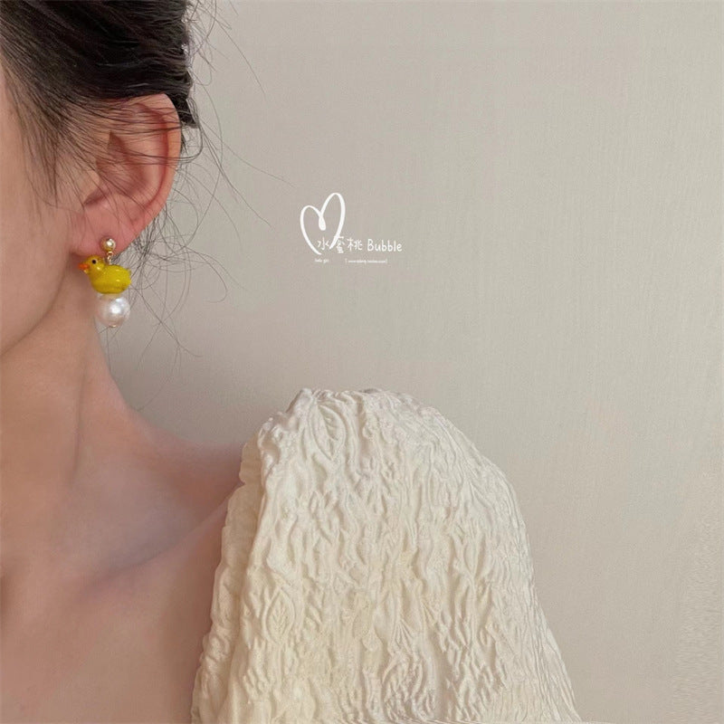 Alloy Yellow Duck Pearl Tassel Earrings (Minimo de compra 2) MYA-BiShang004