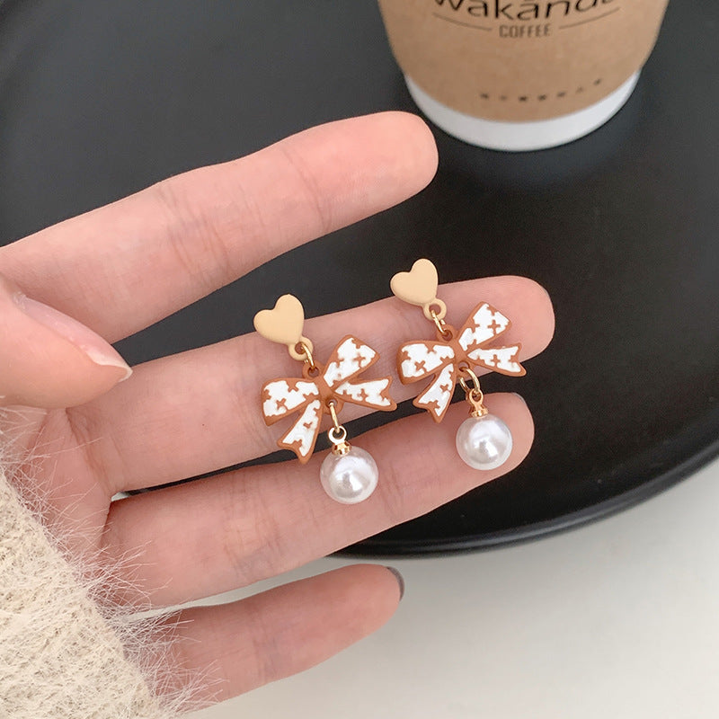 Alloy New Love Bow Earrings (Minimo de Compra 2) MIC-SBL012