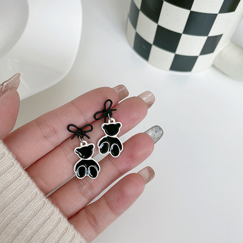 Alloy black and white bow teddy bear earrings MYA-LSY020