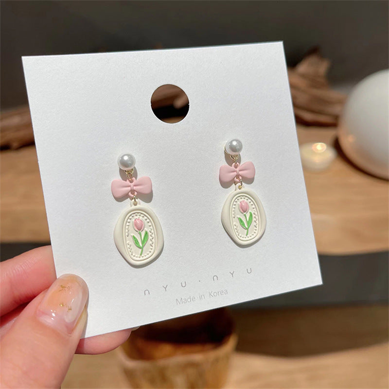 Alloy pink bow earrings (Minimo de Compra 2) MIC-XingS013