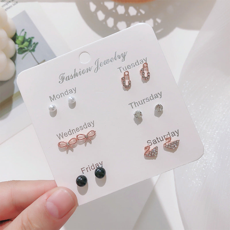 Alloy pearl bow earrings (Minimo de Compra 5) MIC-ShiY013