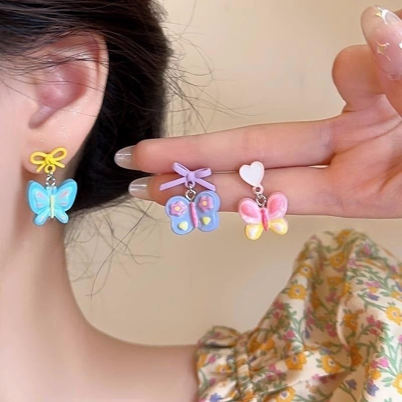 Alloy colored butterfly earrings (Minimo de Compra 2) MIC-XingS008