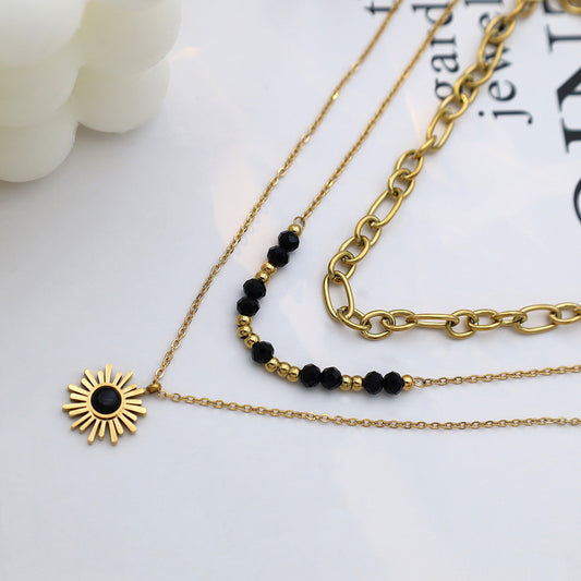 Stainless steel gold-plated three-layer black rice bead sun necklace MYA-XuanJ035