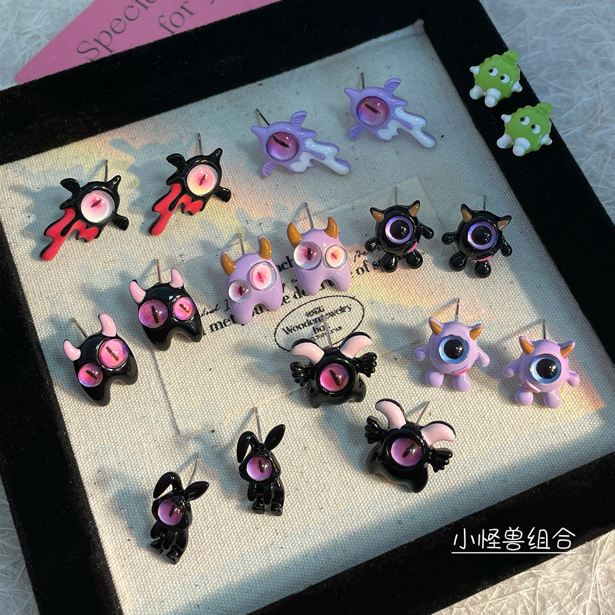 Alloy heterochromatic cute little monster earrings MYA-ShuangX050