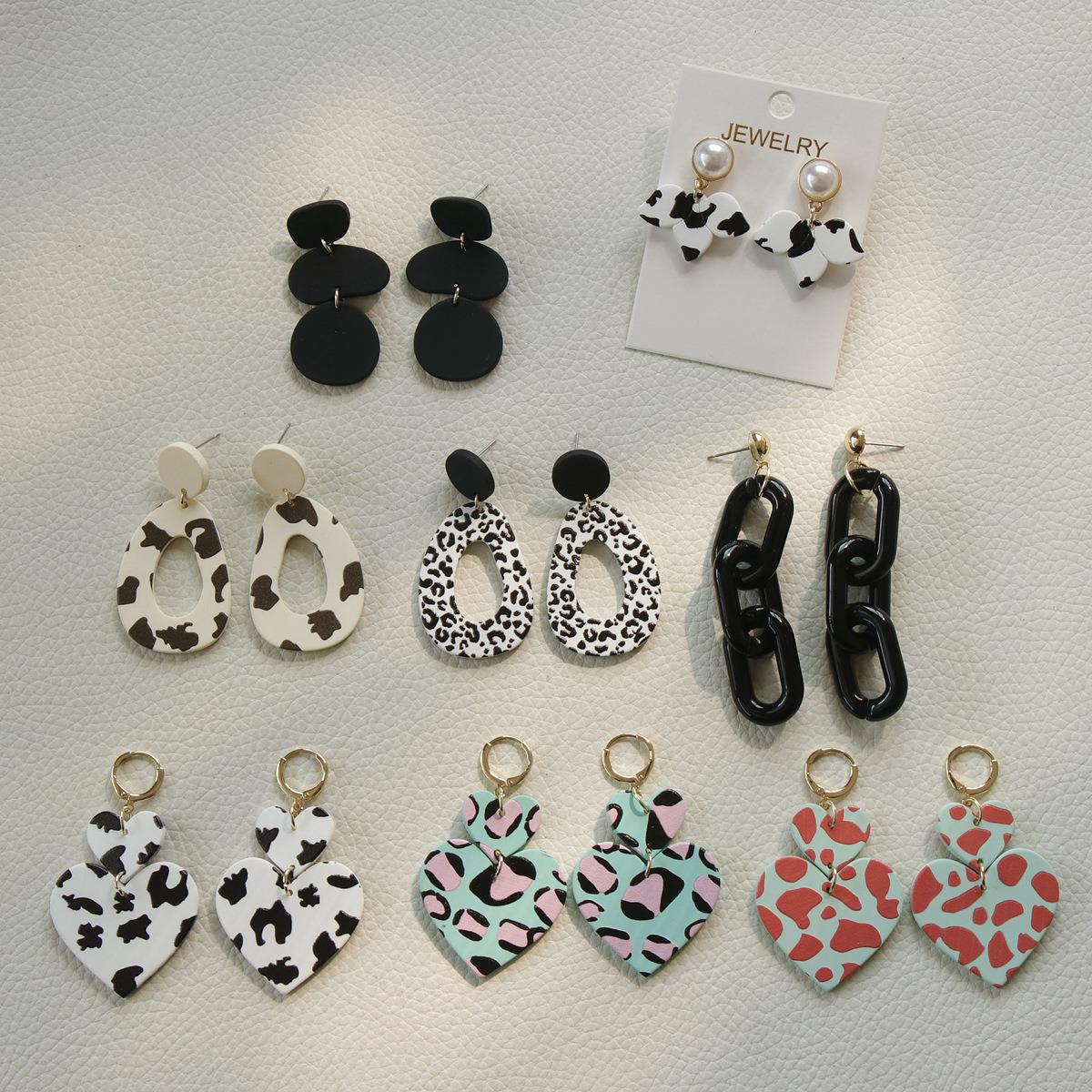 Acrylic apricot colored cow spot earrings MIC-OuY010