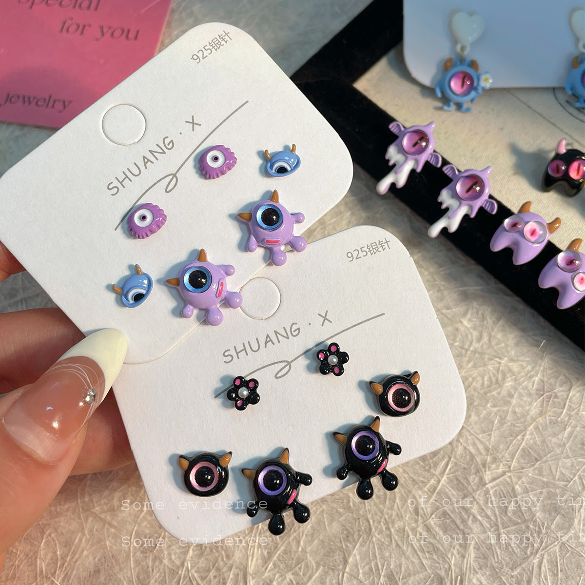 Alloy heterochromatic cute little monster earrings MYA-ShuangX050