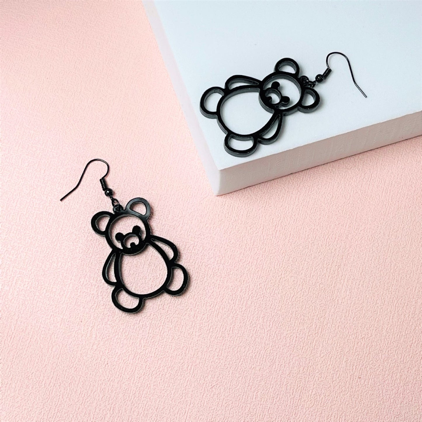 Acrylic black border hollowed out little bear earrings MYA-ChiC030