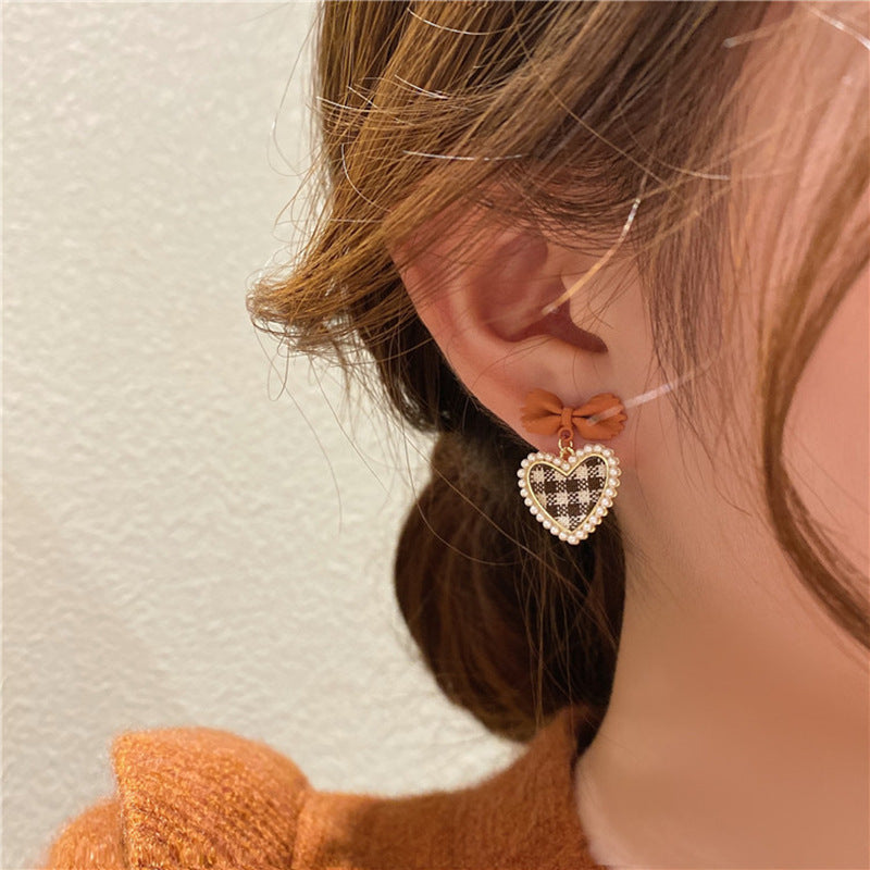 Alloy New Love Bow Earrings (Minimo de Compra 2) MIC-XingS015