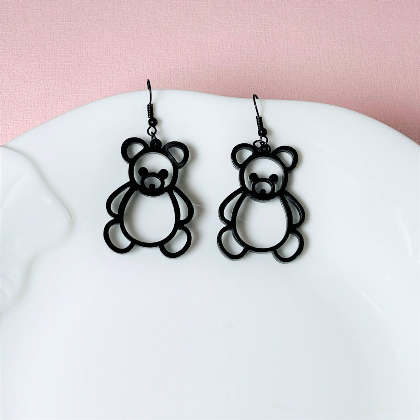 Acrylic black border hollowed out little bear earrings MYA-ChiC030