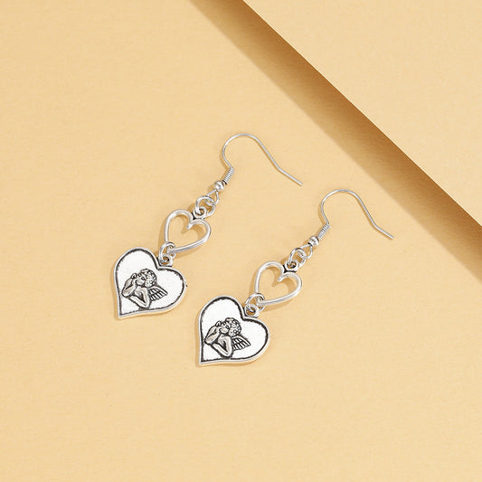 Alloy Hollow Heart Earrings (Minimo de Compra 2) MIC-YingM016