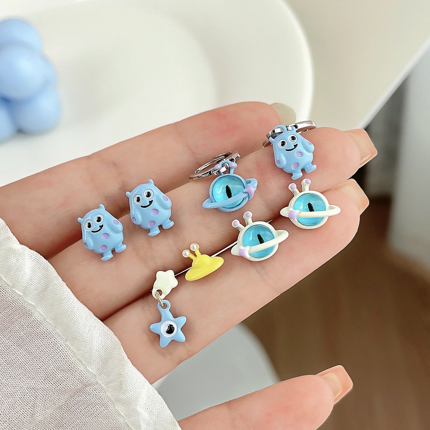 Alloy blue small monster earrings MYA-ShuangX038