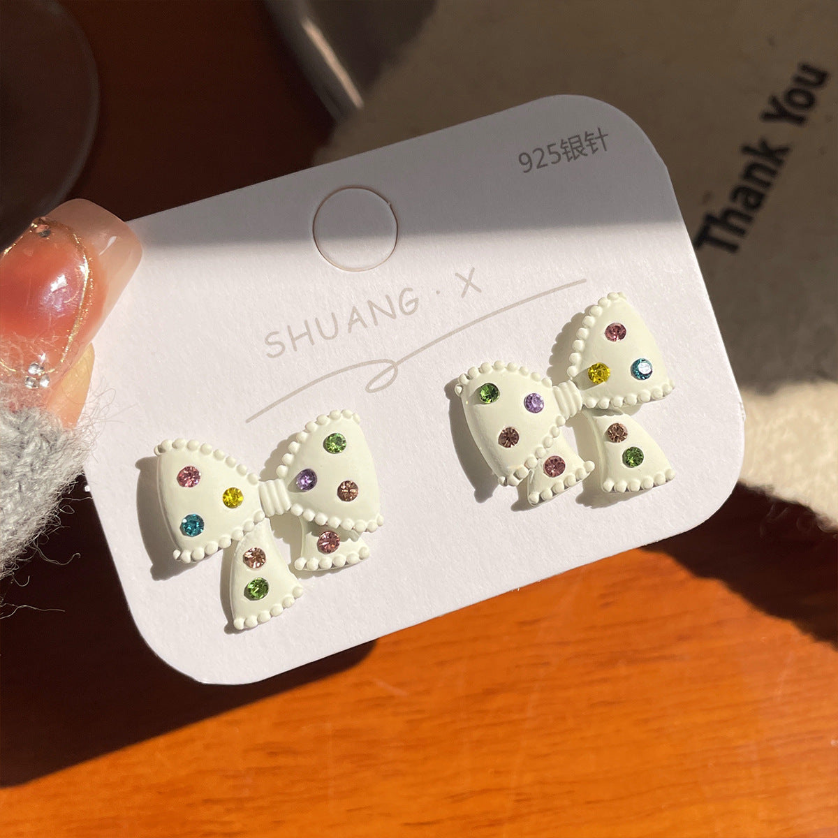 Acrylic colored diamond bow earrings (Minimo de Compra 2) MIC-ShuangX023