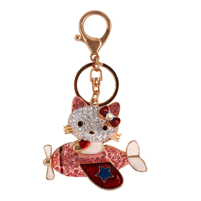 Cartoon aircraft with diamond kitten keychain  (Minimo de compra 2) MIC-ChaoK001