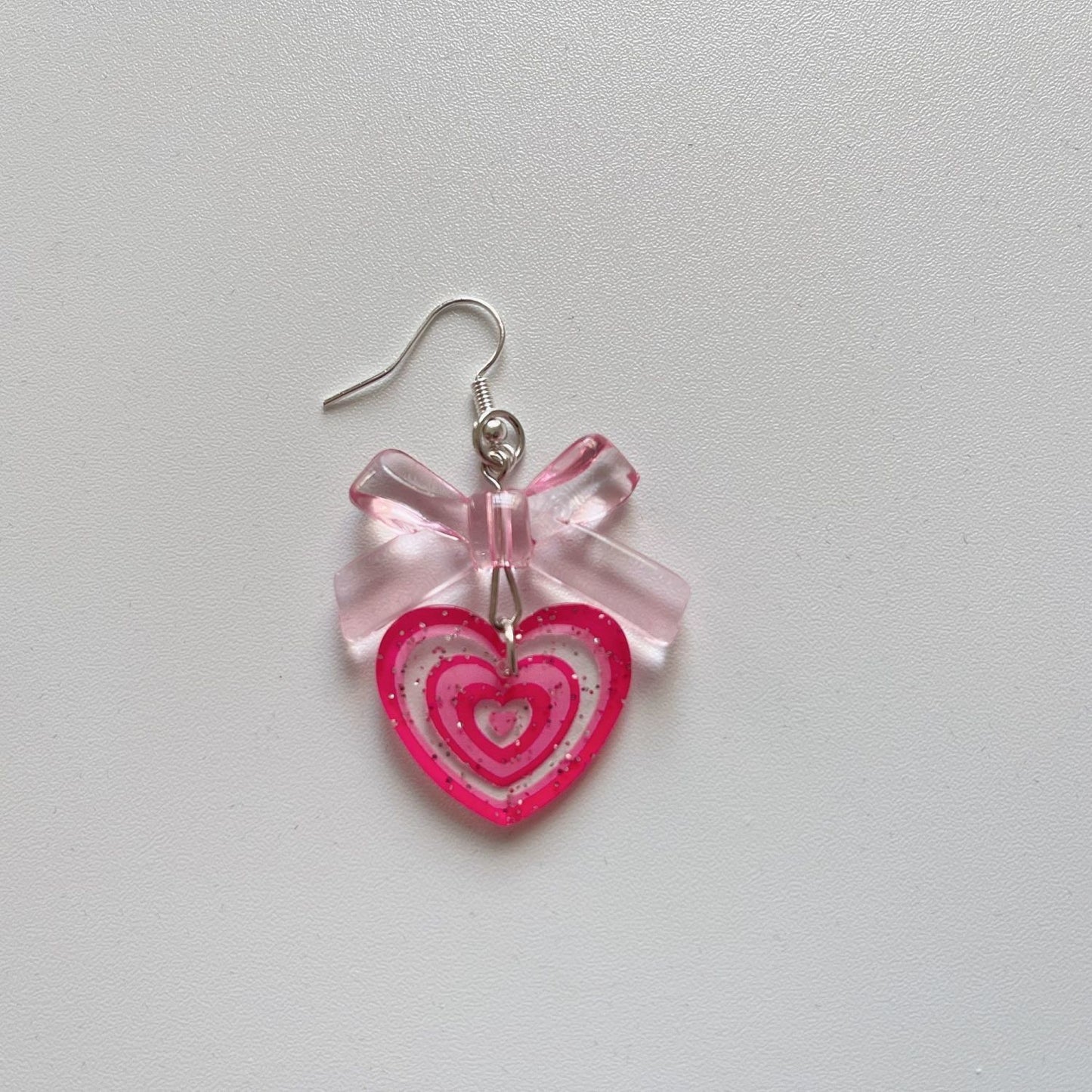 Acrylic Pink Bow Heart Earrings (Minimo de Compra 2) MYA-XiM049