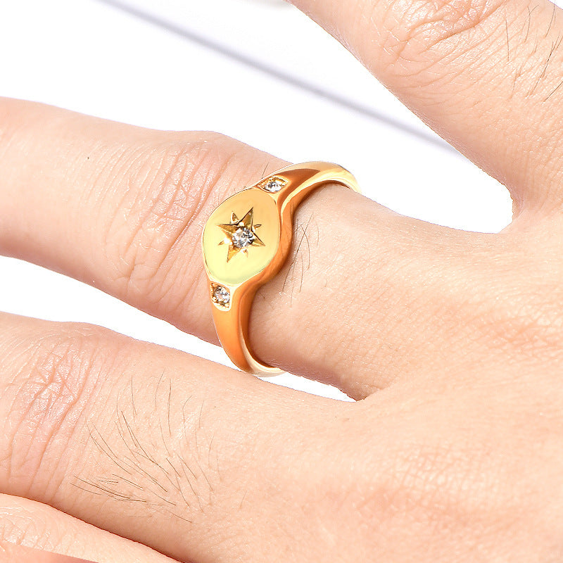 Stainless steel gold-plated ring with three diamonds MYA-YHZX021