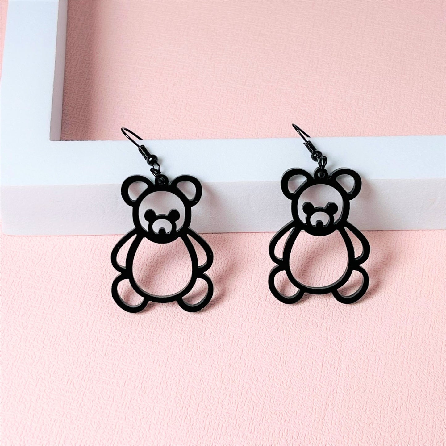 Acrylic black border hollowed out little bear earrings MYA-ChiC030