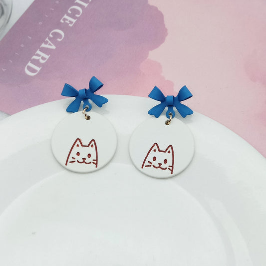 Alloy blue bow ear clip (Minimo de Compra 2) MYA-KaiT008