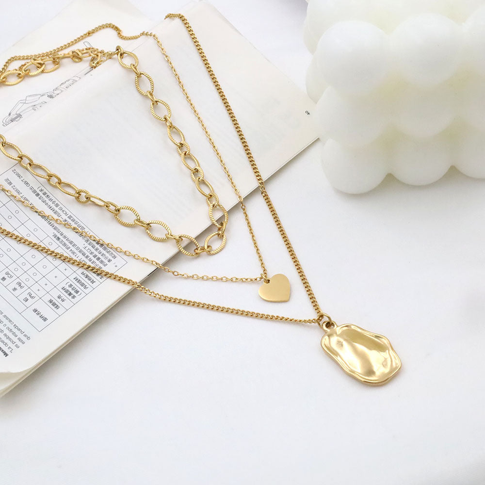 Stainless steel gold-plated triple layered round peach heart necklace MYA-XuanJ025