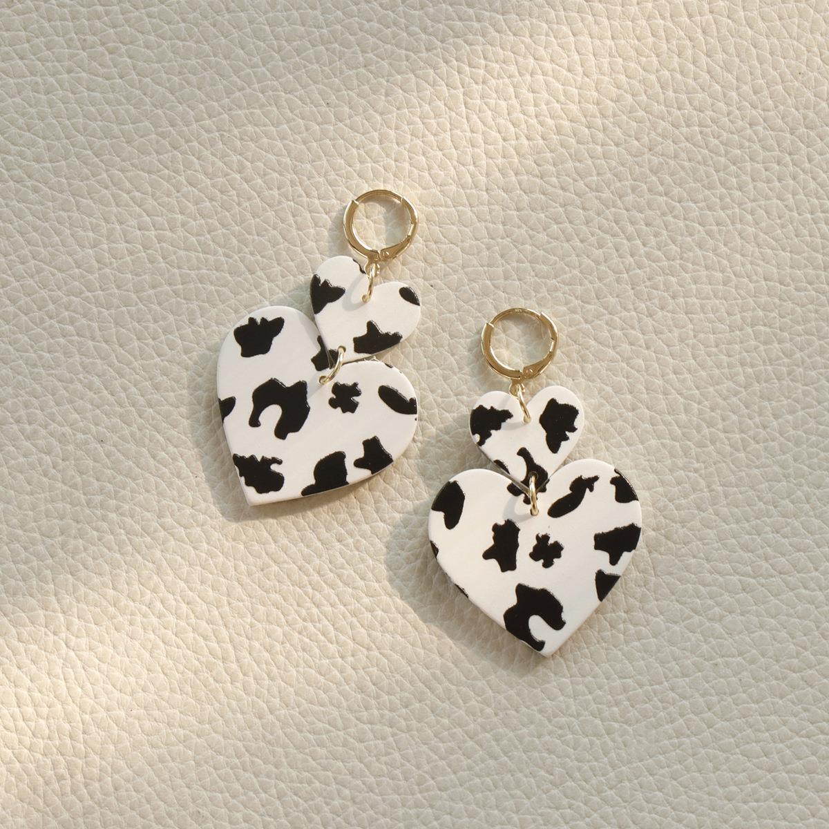 Acrylic apricot colored cow spot earrings MIC-OuY010