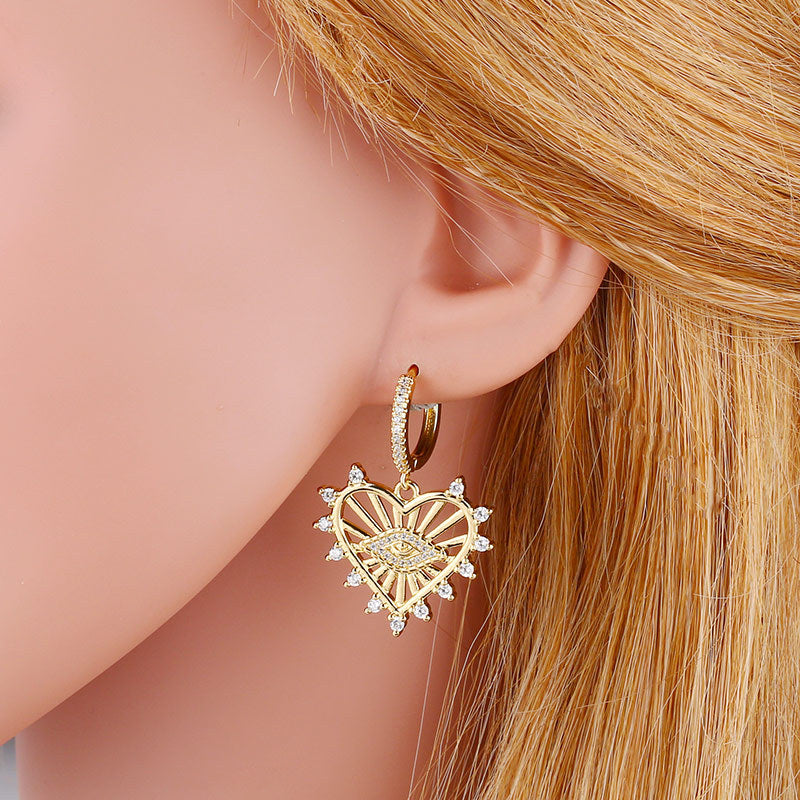 Alloy Hollow Heart Eye Earrings MYA002ES055